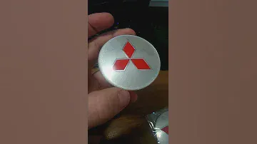 Наклейка на колпак ступицы на mitsubishi asx
