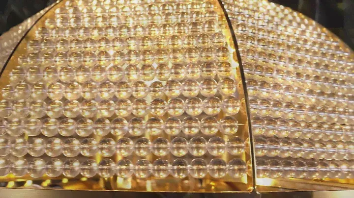 This gorgeous chandelier light fixture features 5 lights with 5tier crystal prisms and wrought gold